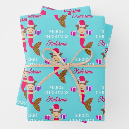 Kerstmeisje kerstman kerstman kerstman kerstman ke inpakpapier vel (In situ)