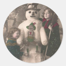 Kerstmeisjes en Snowman  Foto