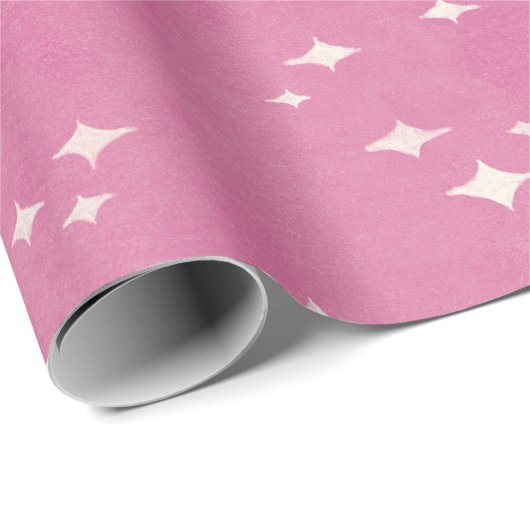Kerstmis begint in een roze warme roze cadeaupapier (Rol Hoek)