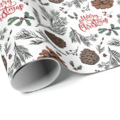 Kerstmis denneappels en hulstbessen op ambachtelij cadeaupapier (Rol Hoek)