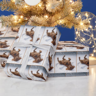 Kerstmis Ierse Setter Maakt een Sneeuwengel Cadeaupapier