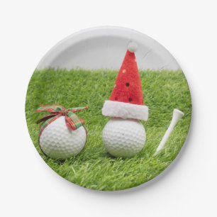 Kerstmis met golfballen en kerstmanden papieren bordje