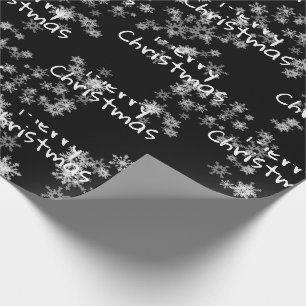 Kerstmis tekst in sneeuwvlokken cadeaupapier