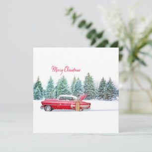 Kerstmis Vintage rode auto met besneeuwd landschap