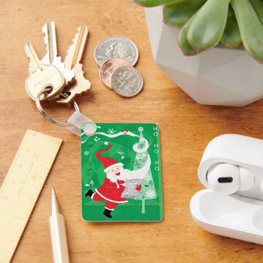Kerstmis, zingende en dansende kerstman sleutelhanger (Bureau)