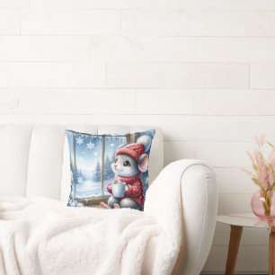 Kerstmuis in het raam met warme cacao kussen