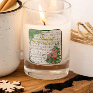 Kerstmuziek op vintage bladmuziek met feestelijke vierkante sticker