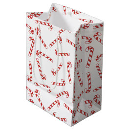 Kerstpatroon met rode en witte snoepriet medium cadeauzakje