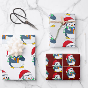 Kerstpinguïn in pet inpakpapier vel
