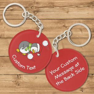 Kerstpinguïn Krijgt Een Sneeuwbal Sleutelhanger