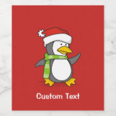 Kerstpinguïn loopt op sneeuw wijn etiket (Enkel label)