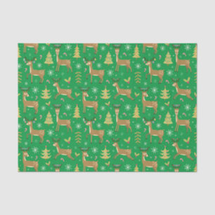 kerstrenrendieren die onder kerstbomen groen spele tissuepapier