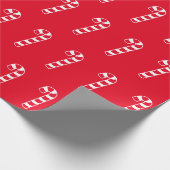 Kerstrood en wit patroon van snoepsnoeren cadeaupapier (Hoek)