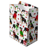 Kerstrottweiler met gemiddelde cadeautas (Achterkant Gekanteld)