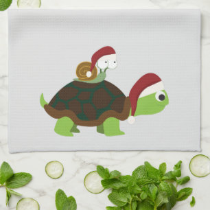 Kerstslak op een schildpad theedoek