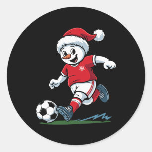 Kerstsneeuwman speelt voetbal grappige speler peut ronde sticker