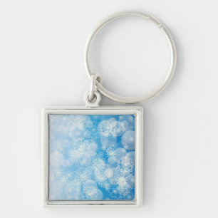 Kerstsneeuwvlokken op een blauwe achtergrond sleutelhanger