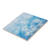 Kerstsneeuwvlokken op een blauwe achtergrond tegeltje (Zijkant)