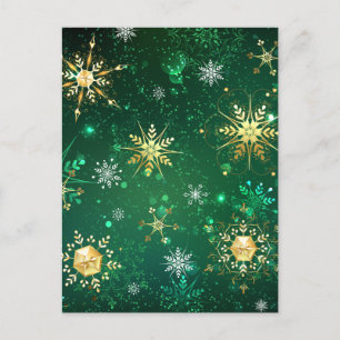 Kerstsneeuwvlokken van goud op een groene achtergr briefkaart