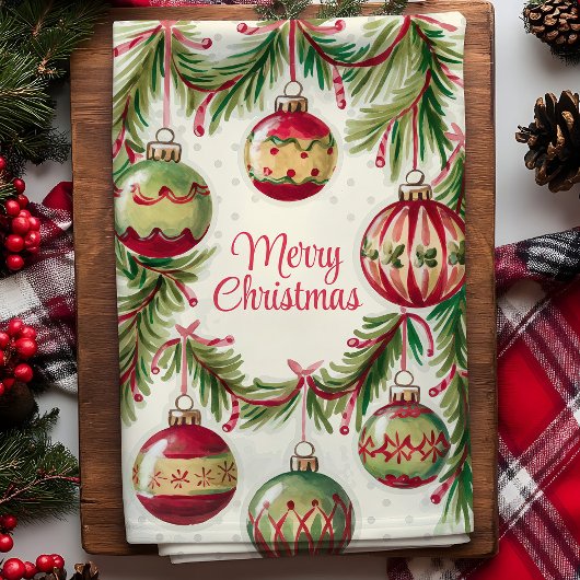 Kerstversiering en dennentakken theedoek