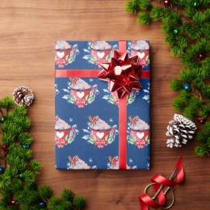 Kerstwarme chocolade op blauw cadeaupapier
