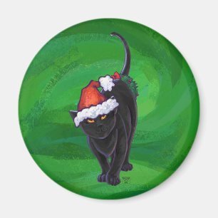 Kerstzwarte kat op groen magneet