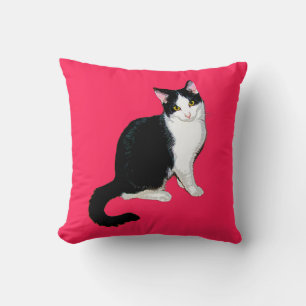 Keukenkat, zwart en wit, warm roze kussen
