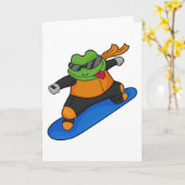 Kikker als snowobarder met snowboard kaart (Gele Bloem)