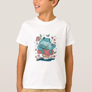 Kikker die op een champignonkern uitspringt t-shirt