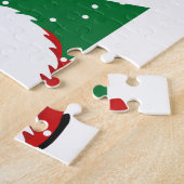 Kind kerstpuzzel met grappige rode gnomen legpuzzel (Zijkant)