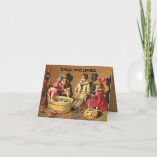  kinder bobbing voor appels Halloween Kaart