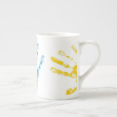 Kinder handafdrukken in verf porselein kop (Rechts)