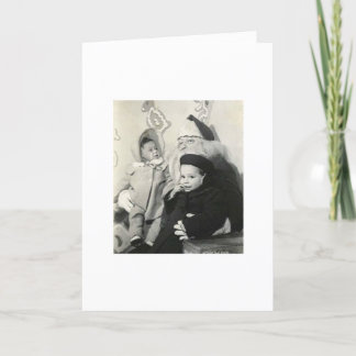 KINDER ZITTING OP DE OVERLAPPING VAN DE KERSTMAN FEESTDAGEN KAART