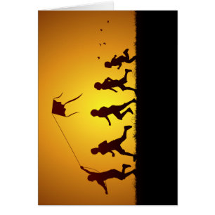 Kinderen die een vlieger voeren