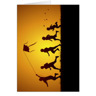 Kinderen die een vlieger voeren