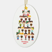 Kinderen die het Ornament van Kerstmis van Hymnes (Links)