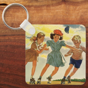  kinderen, jongens meisjes met rolschaatsen sleutelhanger