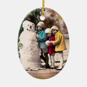 KINDEREN MET SNOWMAN KERAMISCH ORNAMENT