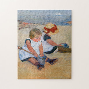 Kinderen spelen op het strand legpuzzel
