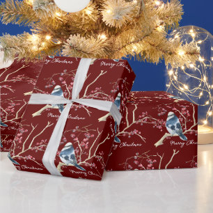 Kippen in kerstkleien cadeaupapier
