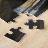 Kitten avec un puzzle à oreille perle (Côté)