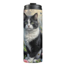 Kitten in de bloementuin