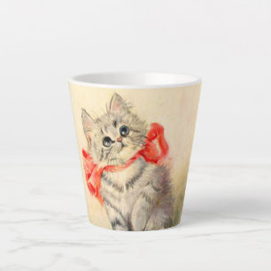 Kitten met een rood lint latte mok