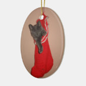 Kitty dans un ornement de bas (Gauche)