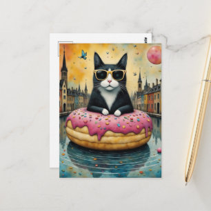 Kitty op vakantie in een zwevende donut briefkaart