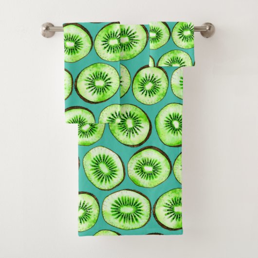 Kiwi snijdsels op turquoise bad handdoek (Insitu)