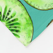 Kiwi snijdsels op turquoise fleece deken (Hoek)