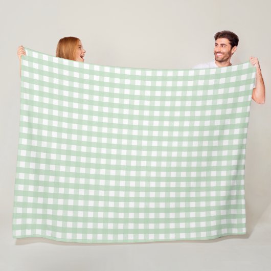 Klassiek patroon van groene en witte gingham fleece deken (In situ)