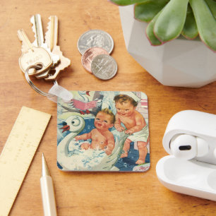 Klassieke kinderen spelen met bubbels in zwanenbad sleutelhanger