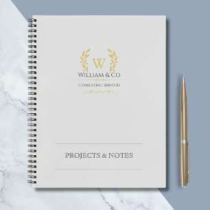 Klassieke laurel krans grijs goud monogram notitieboek